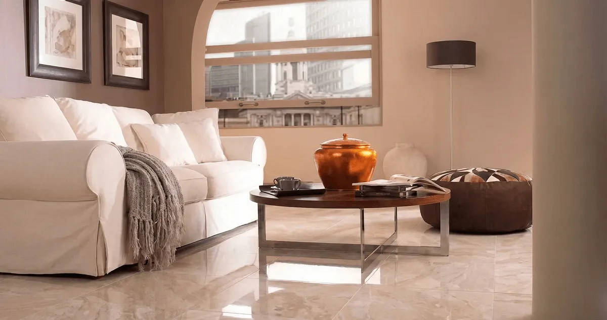 Modern living room with professionally installed marble flooring, a beige sofa, coffee table in Tampa, FL
