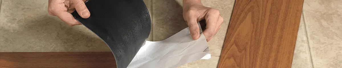 A professional installing vinyl flooring in Tampa, FL